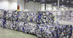 Large bales of recycled material inside a Quincy Recycle facility.
