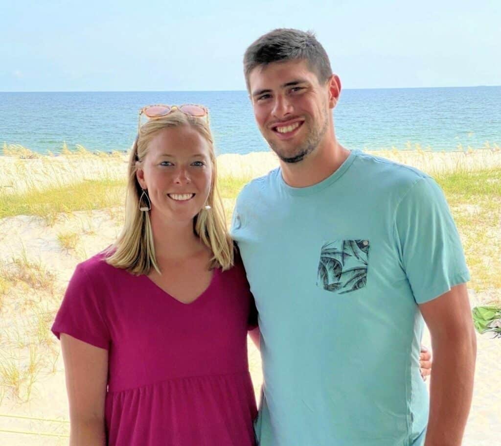 Photo of Kelsey Hayes and her husband at the beach